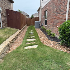 Fort-Worth-Side-Yard-Transformation-Low-Maintenance-Stone-Walkway-Rock-Bed-Installation 0